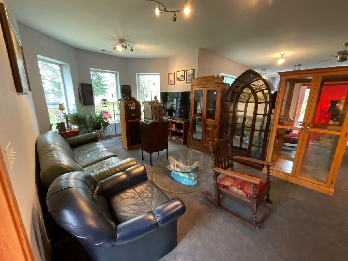 nautical antiques, vintage furniture, curio cabinets, library bookcases, restored cast iron cookware, antique telephones, men’s suits, garage items, eclectic home décor, and unique yard art.