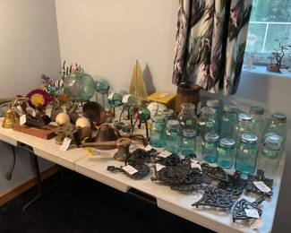 Collector’s Estate Sale featuring nautical antiques, vintage furniture, curio cabinets, library bookcases, restored cast iron cookware, antique telephones, men’s suits, garage items, eclectic home décor, and unique yard art.
