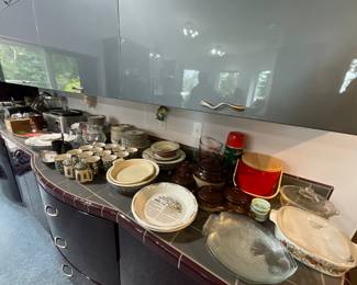 Collector’s Estate Sale featuring nautical antiques, vintage furniture, curio cabinets, library bookcases, restored cast iron cookware, antique telephones, men’s suits, garage items, eclectic home décor, and unique yard art.