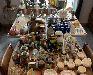 Collector’s Estate Sale featuring nautical antiques, vintage furniture, curio cabinets, library bookcases, restored cast iron cookware, antique telephones, men’s suits, garage items, eclectic home décor, and unique yard art.