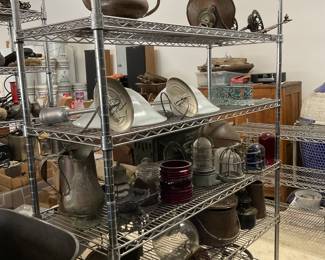 Collector’s Estate Sale featuring nautical antiques, vintage furniture, curio cabinets, library bookcases, restored cast iron cookware, antique telephones, men’s suits, garage items, eclectic home décor, and unique yard art.