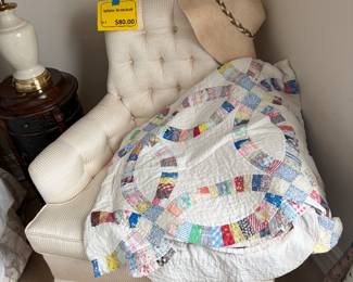 White armchair. Quilt