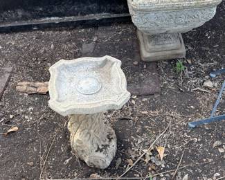 Pair of planters and bird bath