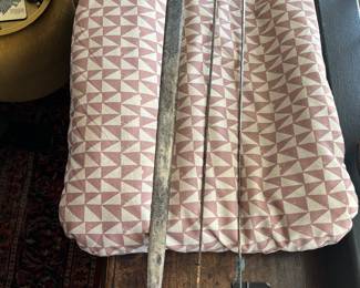 Fencing swords and a sword 