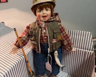 Porcelain fishing boy