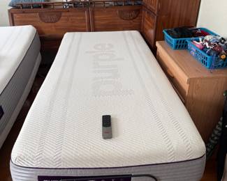 2021 Twin size adjustable base w/mattress, and a single standard twin mattress