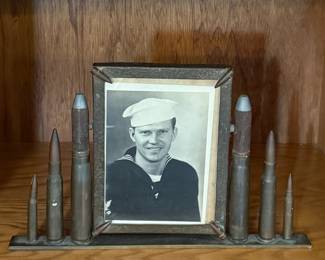 WWII -era trench art picture frame from various bullet casings