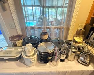 Small kitchen appliances: crock pots, Magic Bullet, blender, Cuisinart