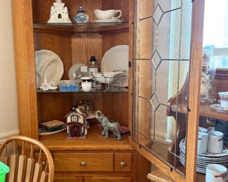 2 of 2 matching lighted corner cabinets