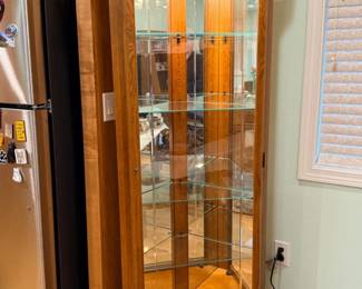 6 HowardMillerCornerLightedCurioCabinet