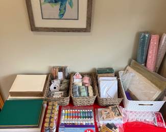 Red height adjustable desk & craft supplies