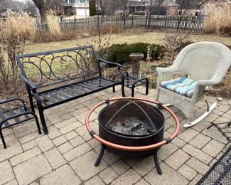 Rattan rocking chair. Aluminum outdoor bench and stools. Huge metal fire pit 
