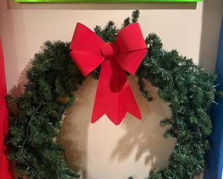 40’ lighted artificial Christmas wreath & Carson Elevator sign 