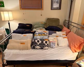 Framed double bed. Sheets and blankets.