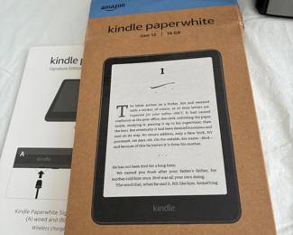 Brand new Kindle - never used.  Generation 12.  16 GB-Plus several other used Kindles!
