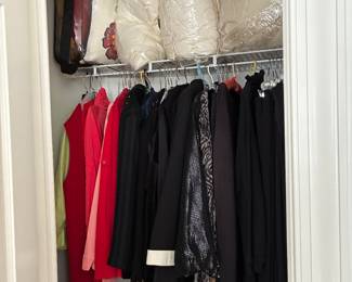 One of several closets of great clothes.  Most are Large and X large size