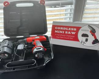 Black Decker 9.6 V Cordless Drill W Charger And Backup Battery And Cordless Mini Saw
