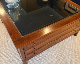 3-drawer coffee table - with glass top - first drawer display drawer