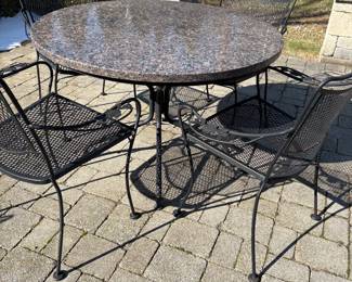 Wood table with four arm chairs and granite top additional piece