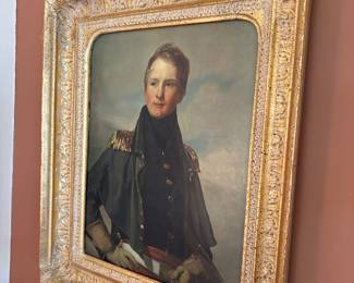 Gold-leaf framed portrait with art lamp