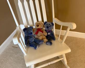 White rocker with stuffies