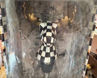 Designer moose wine stopper...we have napkin rings to match.