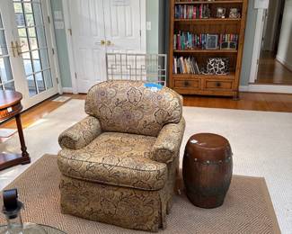 agreat pine bookcase and easy chair 