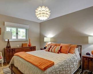 This image is for staging purposes only. To showcase the MCM piece under the window, cane back chair and headboard (which I know you can't see well ;) )