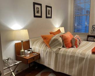 This image is to for staging purposes only to showcase the lamps and MCM headboard. As well as the wall decor. Vintage Mid-Century Modern Teak Headboard with Floating Nightstands - $600