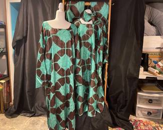 Two Brown Green Dresses And Wraps