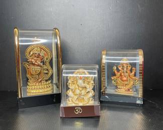 Ganesha Figurines in Display Cases