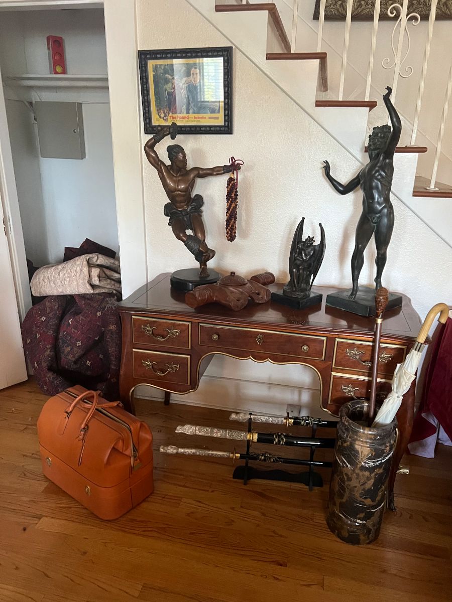Bronzes (middle-Satan as Fallen Angel/Jean-Jacques/1807-1850)) (far right-"Dancing Faun"/signed Antonio)    Kindel Grand Rapids Desk,  below is a 3 piece Katana Decorative  Sword Set,  Rare Vintage Swaine Adeney Brigg leather bag....several rugs