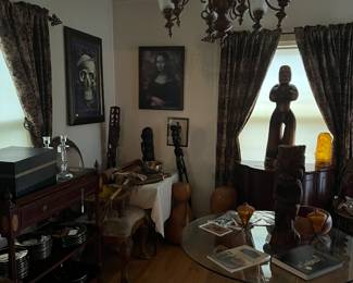 Hawaiian collection... round glass wrought iron table..many interesting objects