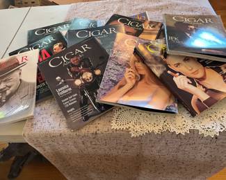 Large collection of cigar magazines. this is a small sample