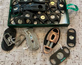 Collection of cigar cutter/trimmer