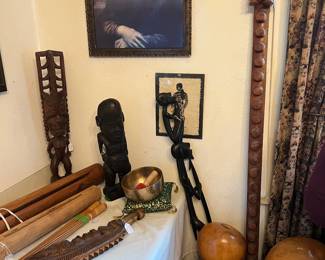 Collection of Hawaiin/Polynesian instruments...Hawaiian/African carved wooden statutes...