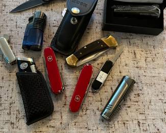 Collection of knives & lighters: Swiss, Kenshaw, Buck, Wenger