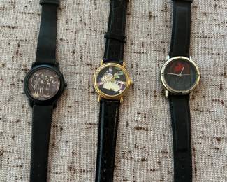Three Disney Villiains watches:  House, ghost & wizard