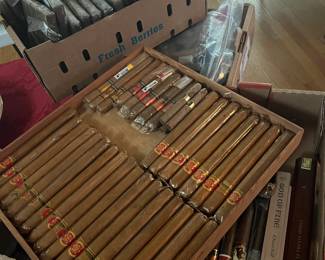 Very large cigar collection...many in original boxes and have been refrigerated...he was a serious collector and has many  books related to cigars..