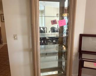 Pulaski Furniture Lighted Curio Cabinet with Mirrored Back