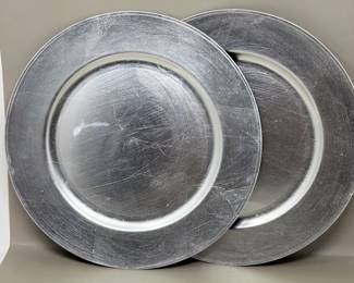 Lot 142 | (2) Silvertone Plastic Charger Plates Chargers
