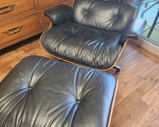 A true collectible...An Eames Black Leather Chair and Matching Black Leather Ottoman! Truly a collector's item!