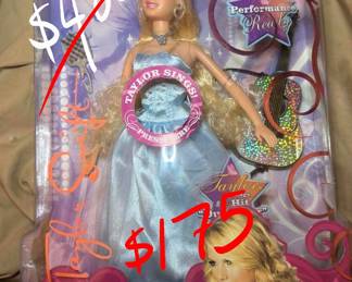 Taylor Swift doll 50% off. Batteries dead 