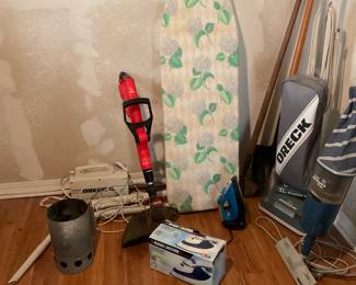 Laundry room items, irons, ironing board, vacuums, tools, weed eater and not shown misc cleaning products.