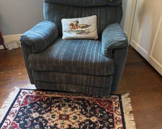 Blue velour upholstery recliner in fair condition