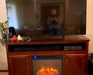 Heater entertainment center & huge TV