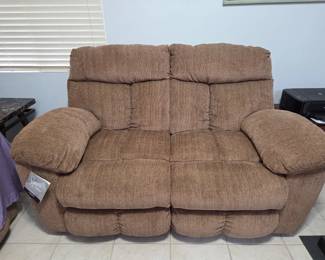 two recliner love seat with tag