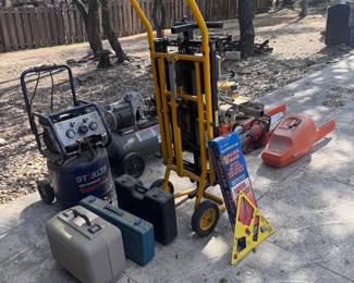 Assorted Power Tools Stealth Air Compressor, Stihl Chainsaws, DeWalt Roller Stand, and Central Machinery Roller Stand