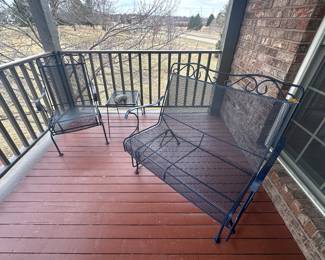 Navy wrought iron glider, navy wrought iron bounce chair and table