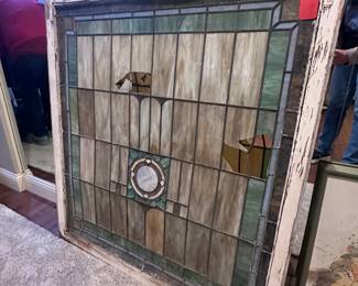 Large stained glass window (a few broken pieces)